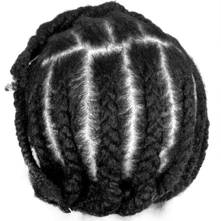 Rachel tells about her experiences with hair in the workplace, different definitions of beauty, and hair as a source of connection.